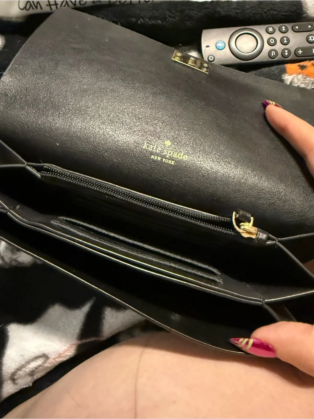 kate spade Black and White Striped Clutch with Logo Plaque